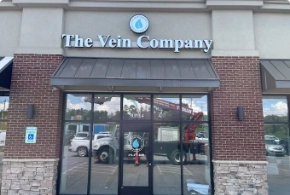 The exterior view of The Vein Company's Morristown medical clinic, featuring brick and stone architecture with professional signage.